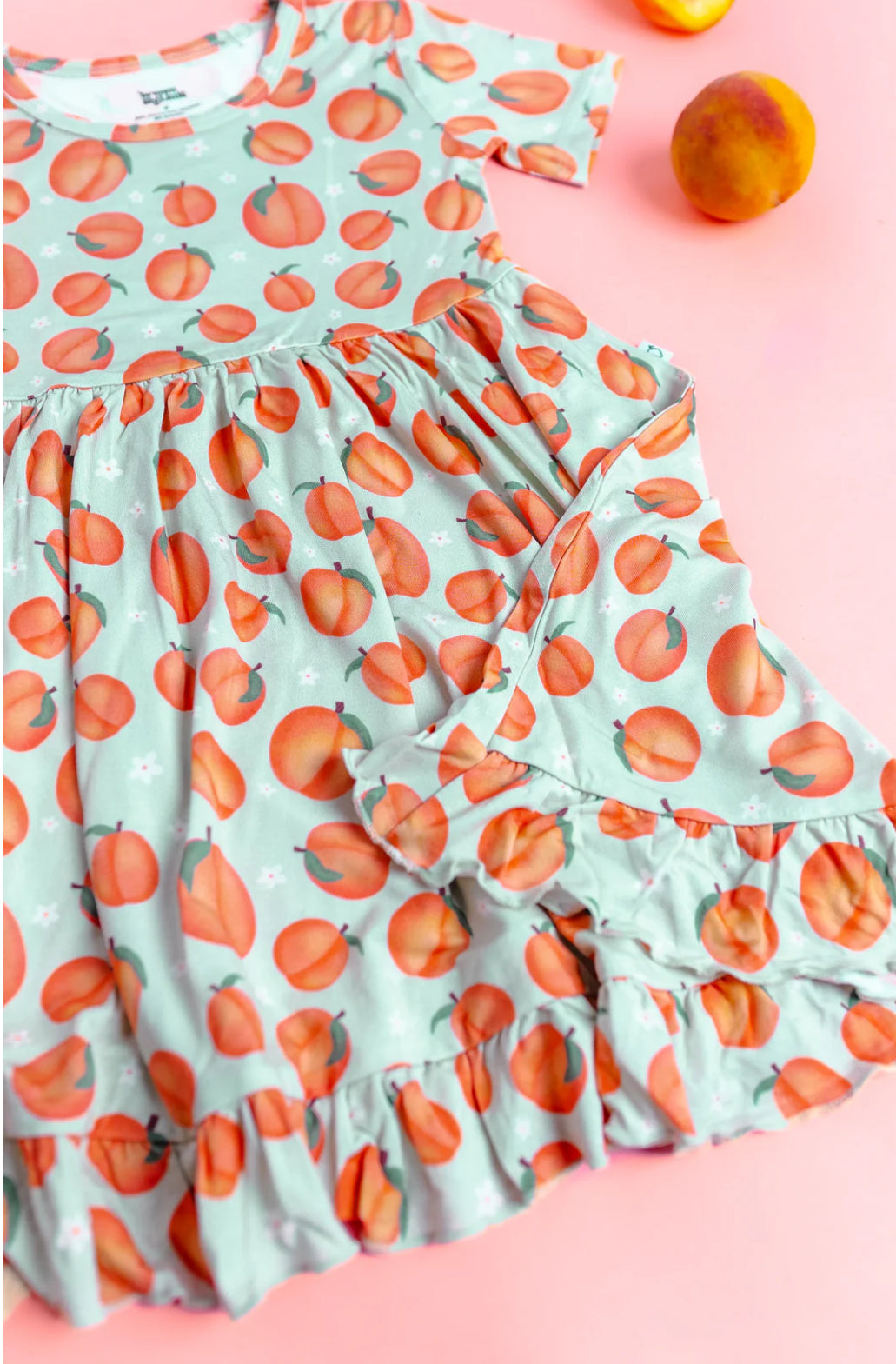 Dream Big Little Co- Peachy Keen Bamboo Ruffle Twirl Dress