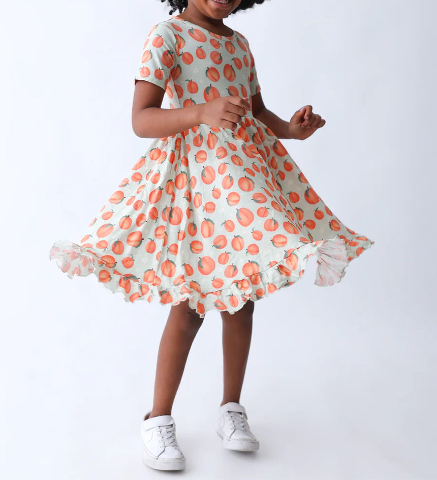 Dream Big Little Co- Peachy Keen Bamboo Ruffle Twirl Dress