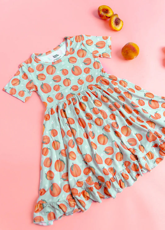 Dream Big Little Co- Peachy Keen Bamboo Ruffle Twirl Dress