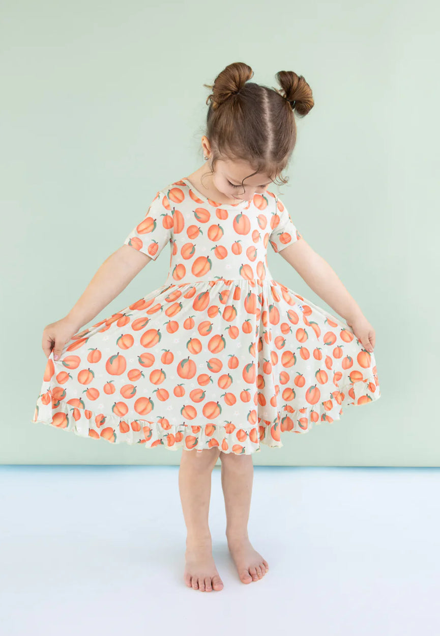 Dream Big Little Co- Peachy Keen Bamboo Ruffle Twirl Dress